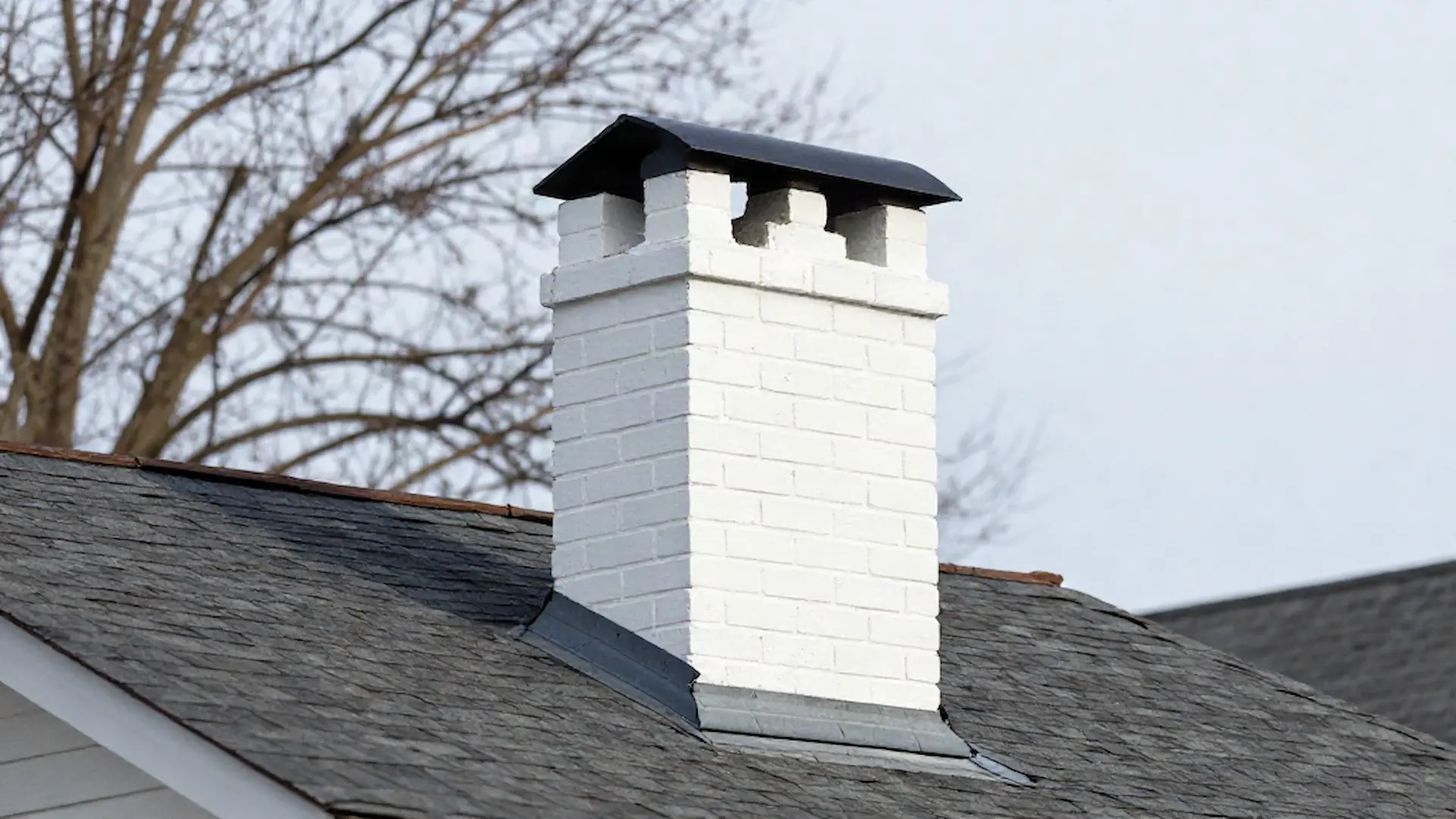 Brick chimney on a home served by JC & Sons Chimney Sweeps in Philadelphia, PA